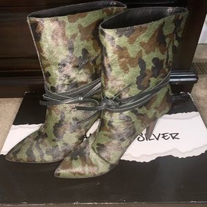 Nine West Heels, one pair Camo and one pair Black.